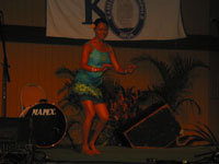 Tracy dancing to white sandy beach