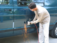 Grinding a hole for battery vent