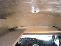 The Surfboard shelf attached to front upper storage