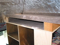 close up of The Surfboard shelf attached to rear storage notice the little cubby hole we created