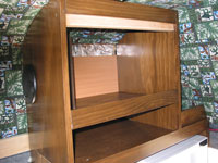 Storage space above Microwave - mainly for toiletry items and firt aid stuff