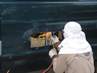 Cutting the battery vent hole I had to put a shirt over my head cause those damn sparks kept burning my big lips